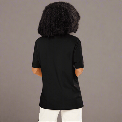 Person wearing a black t-shirt on a white background