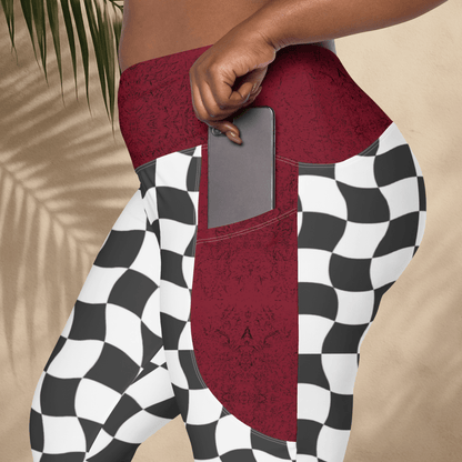 Person wearing a checkered outfit with a red pocket on a neutral background
