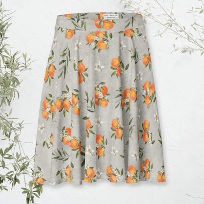 Gray skirt with orange fruit pattern on a white background