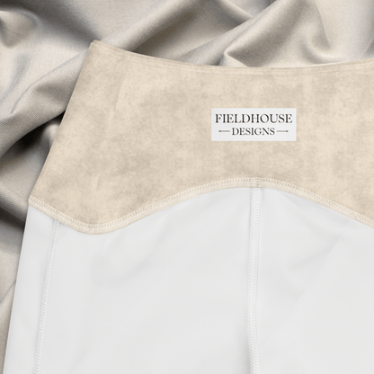 Close-up of a waistband with 'Fieldhouse Designs' label, featuring beige and white colors.
