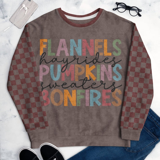 Espresso and burgundy Sweatshirt with colorful text on a marble surface