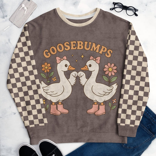 Sweatshirt with cartoon geese and 'GOOSEBUMPS' text on a checkered background