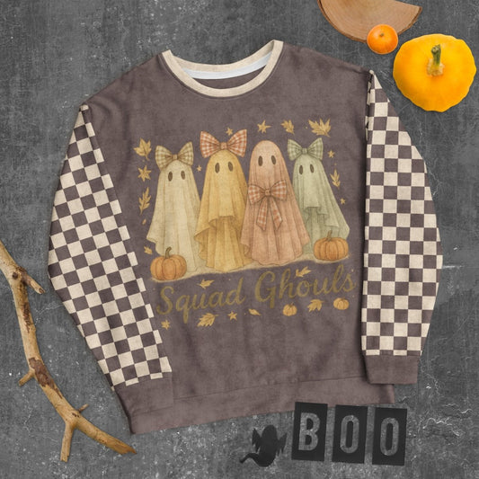 espresso checkered Sweatshirt with ghost design and 'Squad Ghouls' text on a textured surface with pumpkins and a branch.