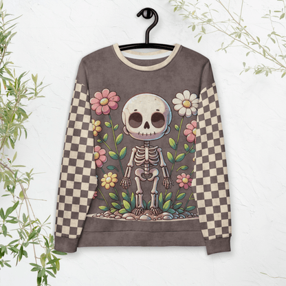 Sweatshirt with a skeleton and floral design on a hanger against a white background