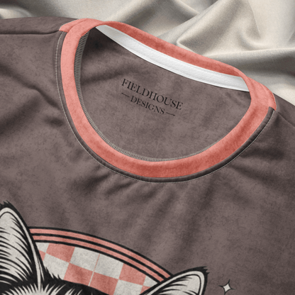 collar close up of an Espresso sweatshirt with a sunglasses-wearing tabby cat and “I Do What I Want” text; sleeves feature pink-and-espresso checkerboard pattern with pink collar and cuffs.