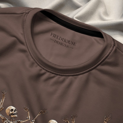 Brown shirt with 'Fieldhouse Designs' logo and skeleton design on a textured fabric background