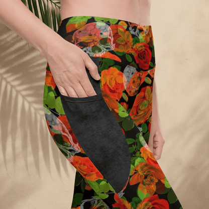 Colorful floral-patterned leggings with a pocket on a beige background