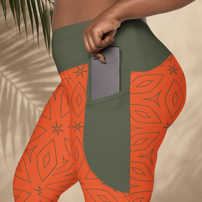 Person wearing green and orange patterned leggings with a pocket on a beige background