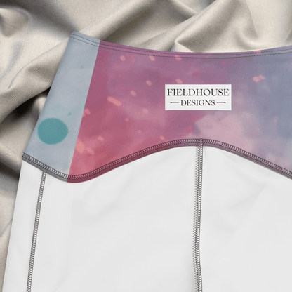 Close-up of a garment with 'Fieldhouse Designs' label on a textured fabric background