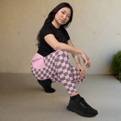 model crouching down while wearing Pink Checkered Print High-Waisted UPF 50+ Pocket Leggings 2XS–6XL