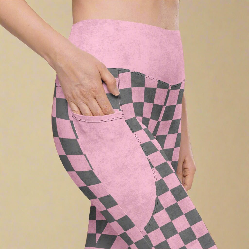 close up view of a model with her hand in the pocket of her Pink Checkered Print High-Waisted UPF 50+ Pocket Leggings 2XS–6XL