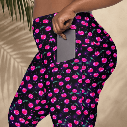 Leggings with pink cherry pattern on a dark background