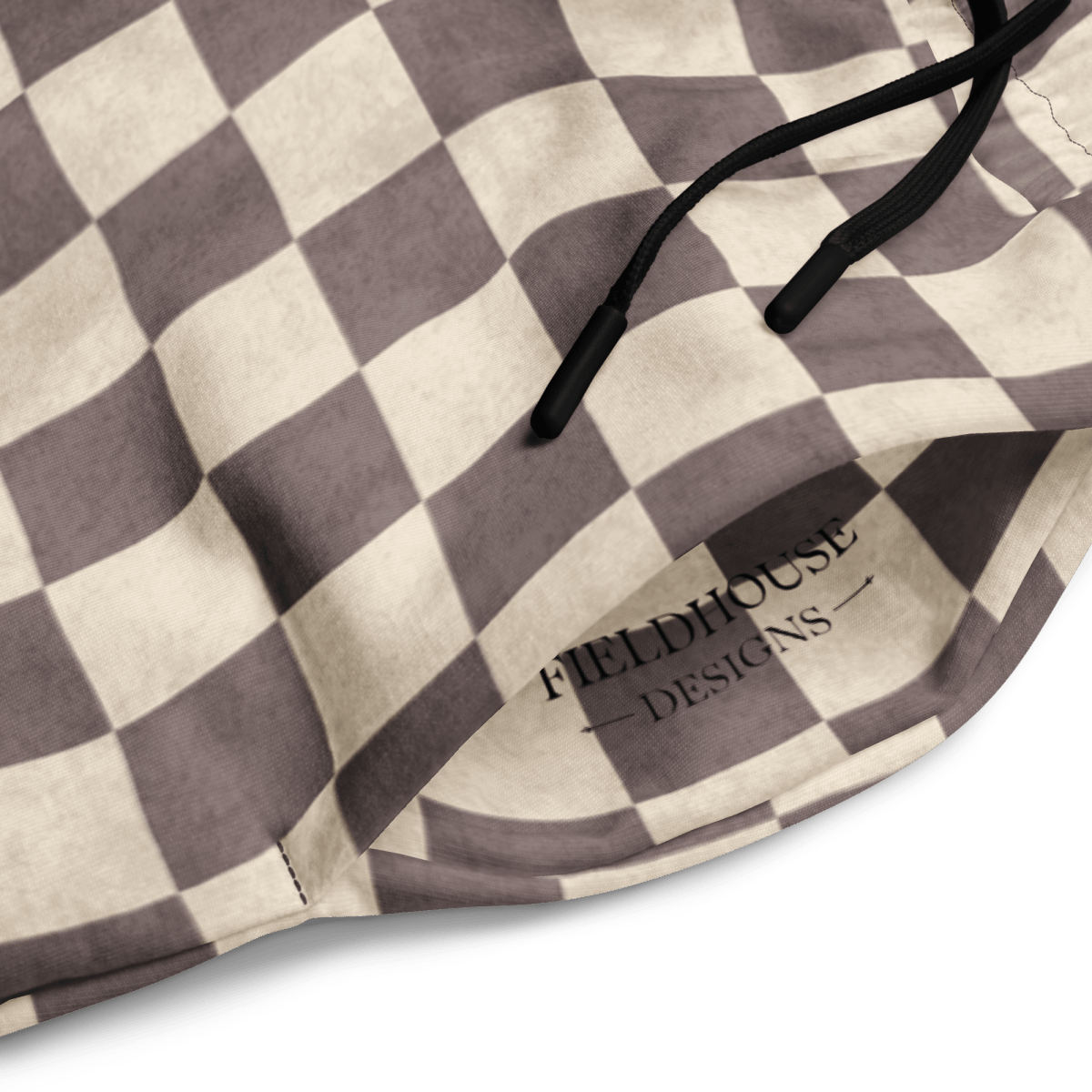 Checkered patterned product with 'Fieldhouse Designs' logo