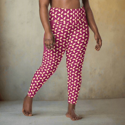 Person wearing purple leggings with cream geometric pattern against a neutral background
