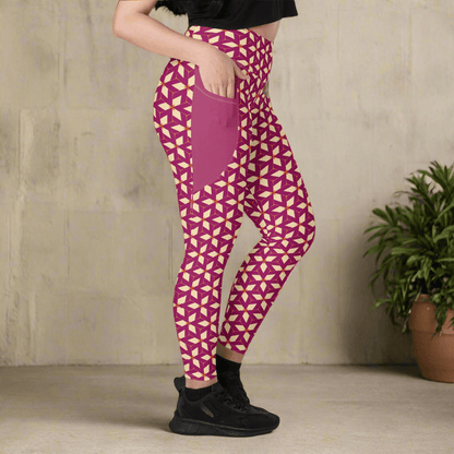 Person wearing purple and cream geometric patterned leggings on a neutral background