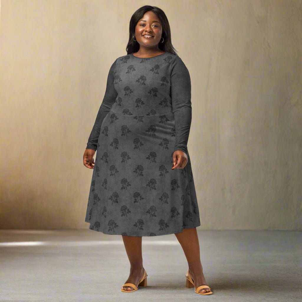 Woman wearing a gray floral dress on a neutral background