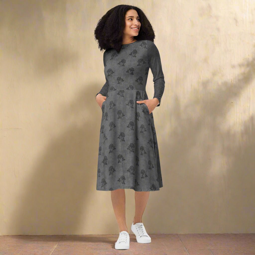 Woman wearing a gray floral dress on a beige background