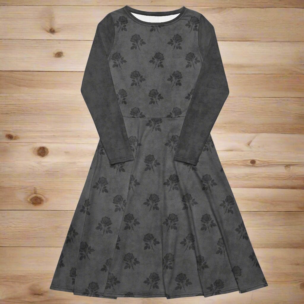Dark gray dress with floral pattern on a wooden surface