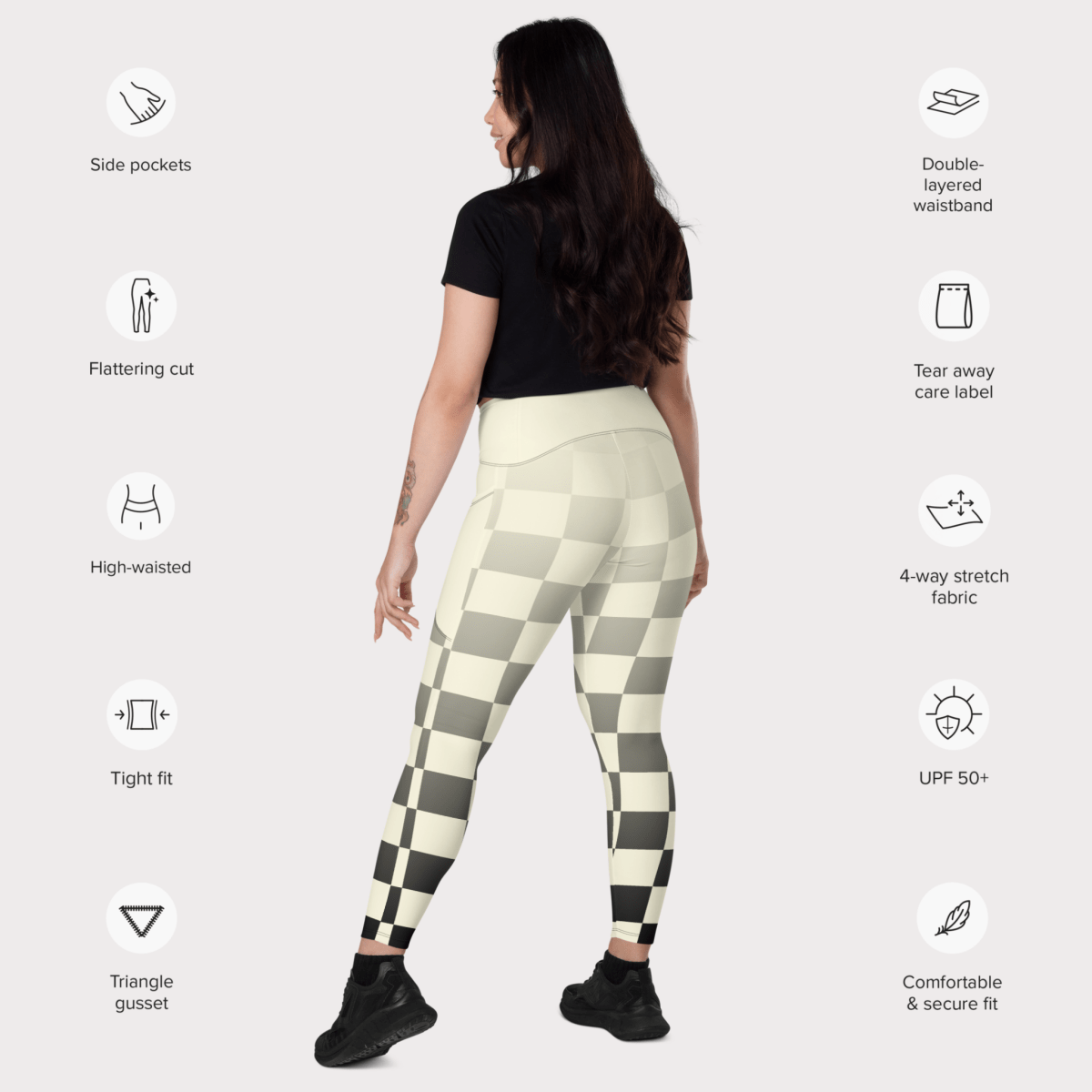 Woman wearing checkered leggings with feature icons on a white background