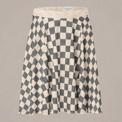 Checkered skirt with a visible brand label on a beige background