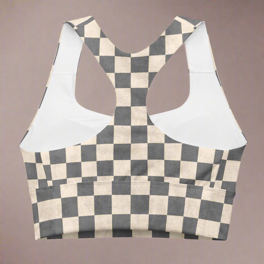 Checkered sports bra with racerback on a beige background