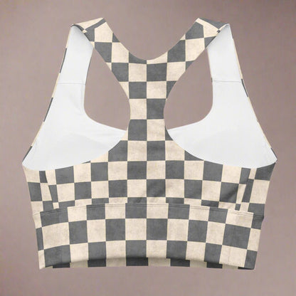Checkered sports bra with racerback on a beige background