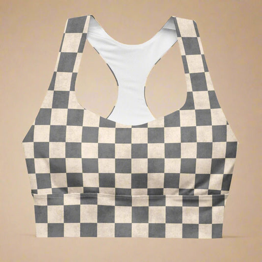 Checkered sports bra with a racerback on a beige background
