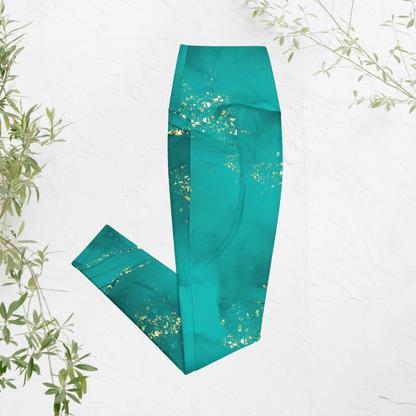 Teal leggings with gold speckles on a white background