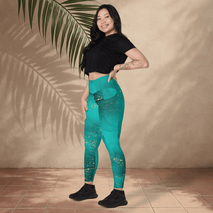 Woman wearing teal leggings with a starry pattern against a beige wall.