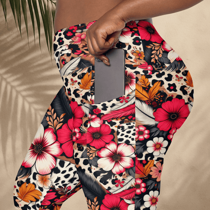 Colorful floral and animal print leggings worn by a person against a beige background.