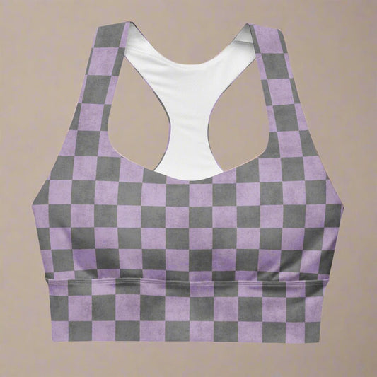 Purple and gray checkered sports bra on a beige background