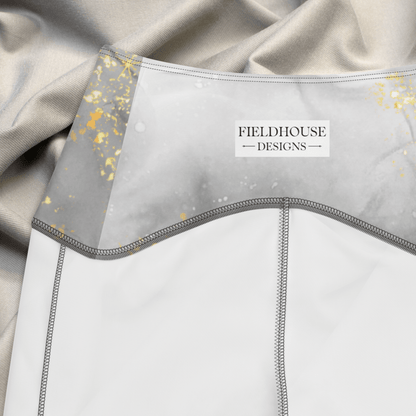 Gray and white waistband with 'Fieldhouse Designs' label