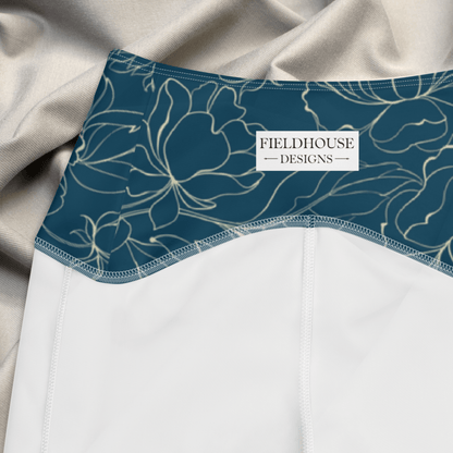 teal waistband with floral pattern and 'Fieldhouse Designs' label on a beige fabric background