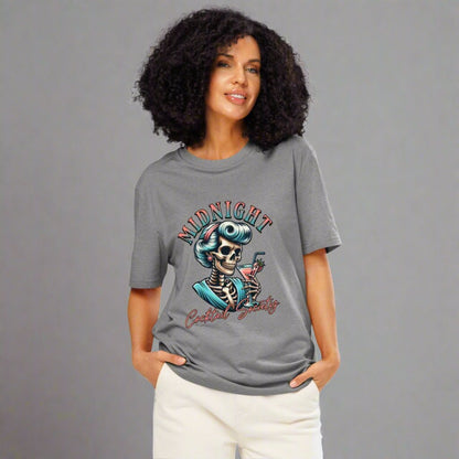 Woman wearing a gray t-shirt with a skeleton design on a white background