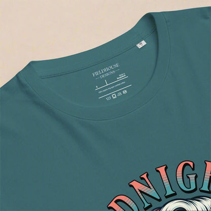 Teal t-shirt with 'Fieldhouse Designs' label on a beige background