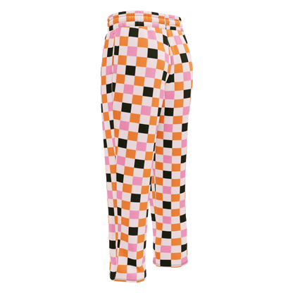 Checkered pants with orange, pink, and black pattern 