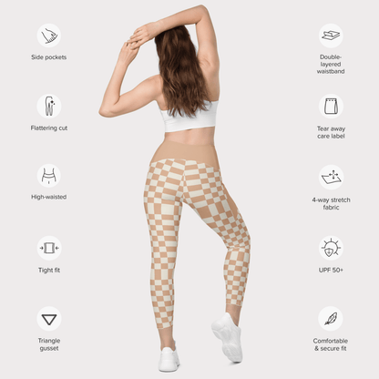 Woman wearing checkered leggings with feature icons on a white background