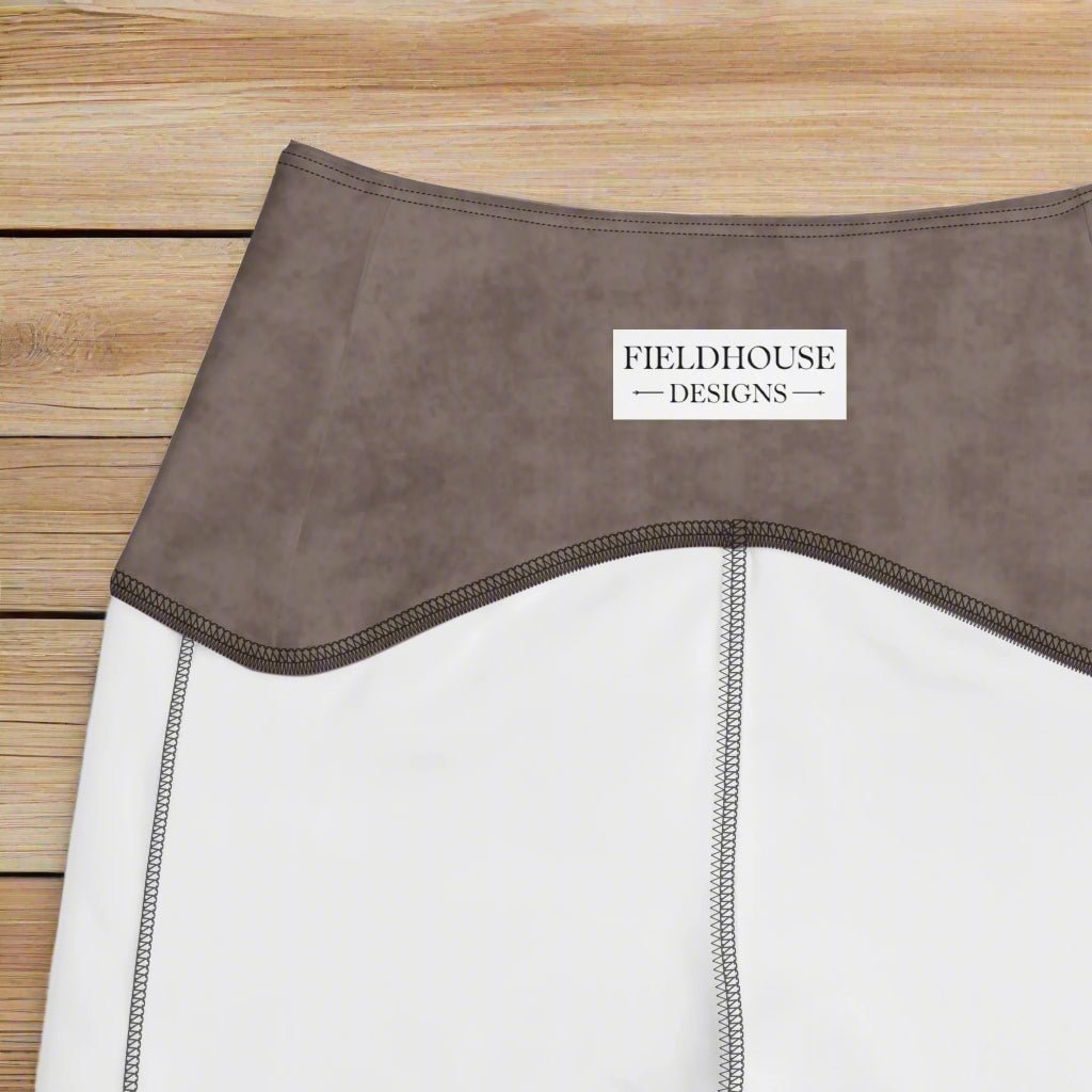 Close-up of a product with 'Fieldhouse Designs' label on a wood background