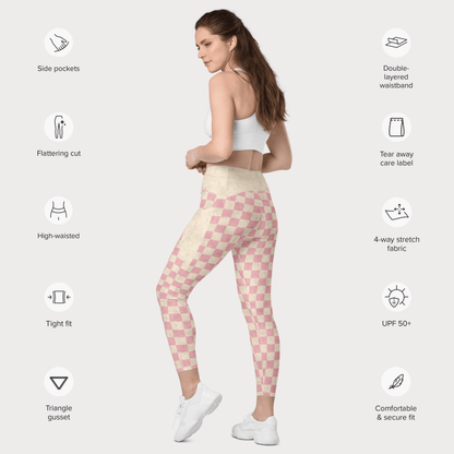 Woman wearing pink checkered leggings with feature icons on a white background