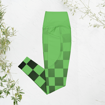 Green checkered leggings on a white background with plant elements.