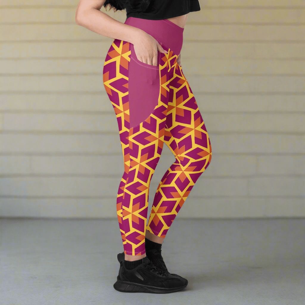 Person wearing purple and yellow geometric patterned leggings on a neutral background
