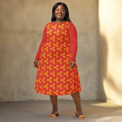 Woman wearing a red and yellow patterned dress on a neutral background