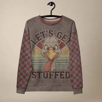 Sweatshirt with a turkey graphic and 'Let's Get Stuffed' text on a hanger