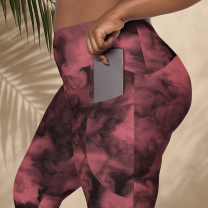 dusty rose tie-dye leggings with a pocket on a neutral background