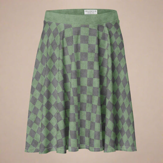 Green and gray checkered skirt on a beige background