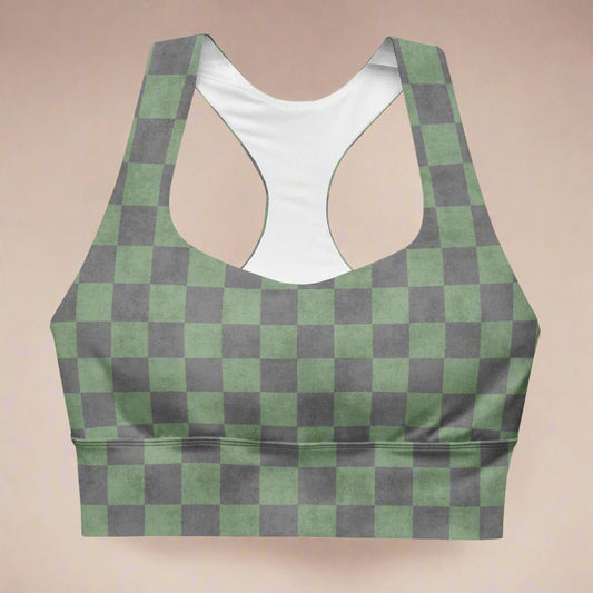 Green and gray checkered sports bra on a beige background