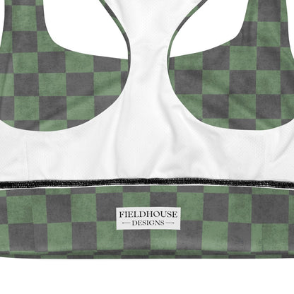Green and gray checkered sports bra with white label on a white background