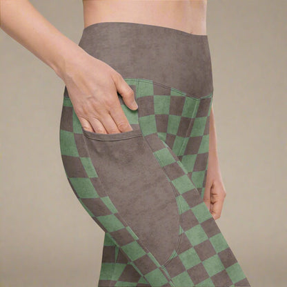 Green and espresso checkered pants with a beige background