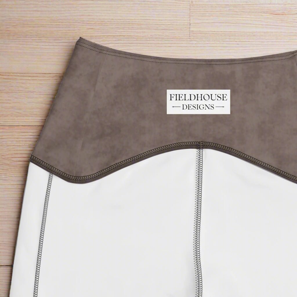 Close-up of a product with 'Fieldhouse Designs' label on a wood background