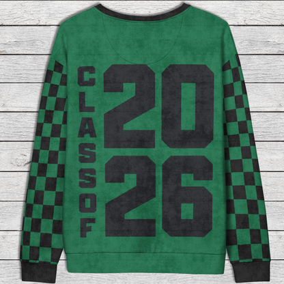 Green sweatshirt with 'Class of 2026' text on a wooden surface